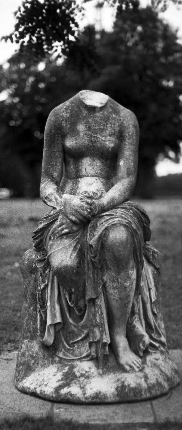 Lost head statue